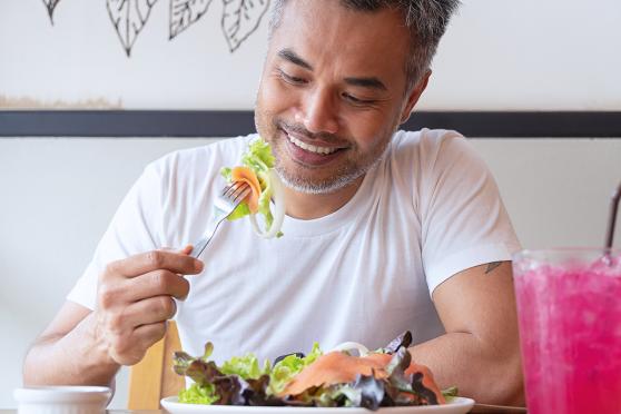 Man eating a salad